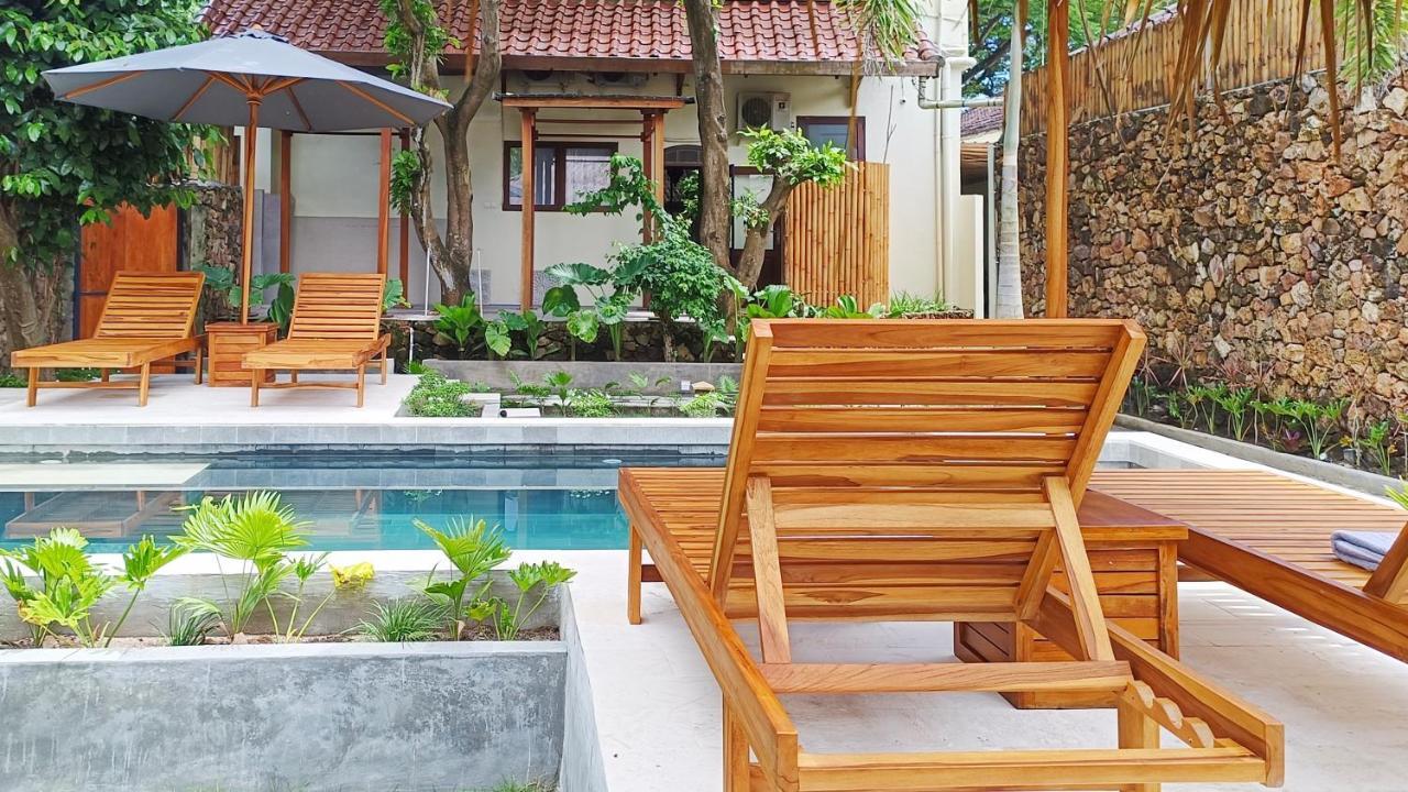 ホテル Dalai Tropical Kuta  エクステリア 写真